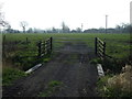 SP6075 : Field entrance off Elkington Road by JThomas