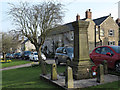 War memorial and houses in Great Longstone