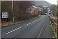 Llanwonno Road passes the Miskin boundary sign