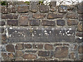 A plaque on the upstream wall of Brayford Bridge