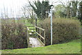 Footbridge and stile at a footpath entrance