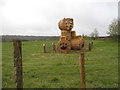 Teddy bear made from hay bales on Bockett