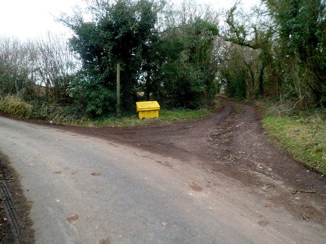 Yellow grit bin at a junction, Five Lanes, Monmouthshire