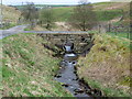 Solid stone bridge in Shepherd Clough