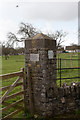 Memorial on stone gate post at Stoney Stratton