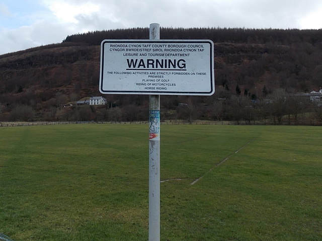 Warning notice at the edge of Glanaman Road recreation ground, Cwmaman