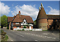 TQ5758 : Cottage and Oast house by Dave Croker