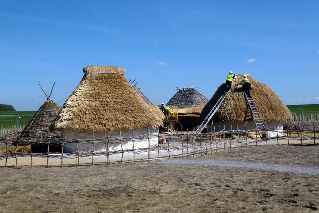 Neolithic houses under construction