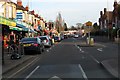 Wokingham Road passes shops near Earley