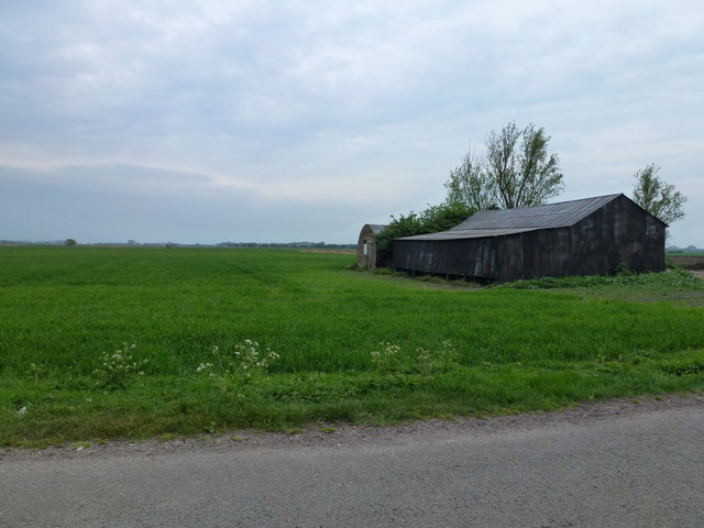 Old tin sheds on North Fen near California, Ely