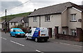 Two care vans parked in Etna Terrace, Gilfach Goch