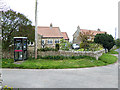 Houses and telephone box at Caldwell