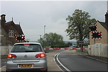 SO4579 : Closed level crossing gates at Onibury station by Roger Davies