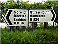 TM4197 : Roadsigns on the B1136 Yarmouth Road by Geographer