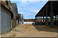 View between sheds at Avington Manor Farm