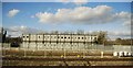 Temporary buildings by the railway line