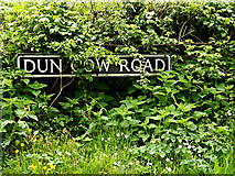 TM4693 : Dun Cow Road sign by Geographer