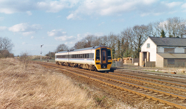 Coventry - Cambridge train passing site of Ashwell station, 1994