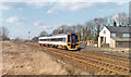 SK8613 : Coventry - Cambridge train passing site of Ashwell station, 1994 by Ben Brooksbank