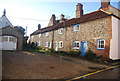 A row of flint built cottages