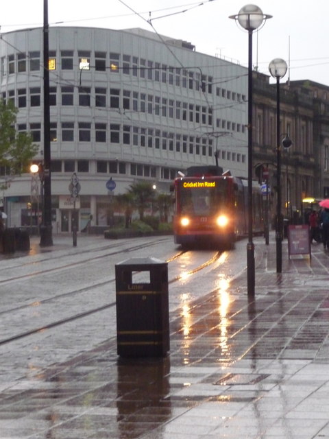 Sheffield: a tram descends High Street