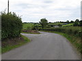 Junction of a private farm lane with the Farranfad Road