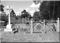 War memorial beside footpath to All Saints church