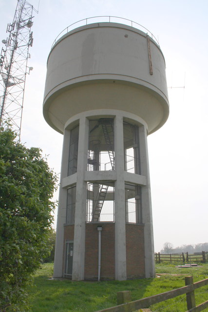 Water tower beside road south from Waltham on the Wolds
