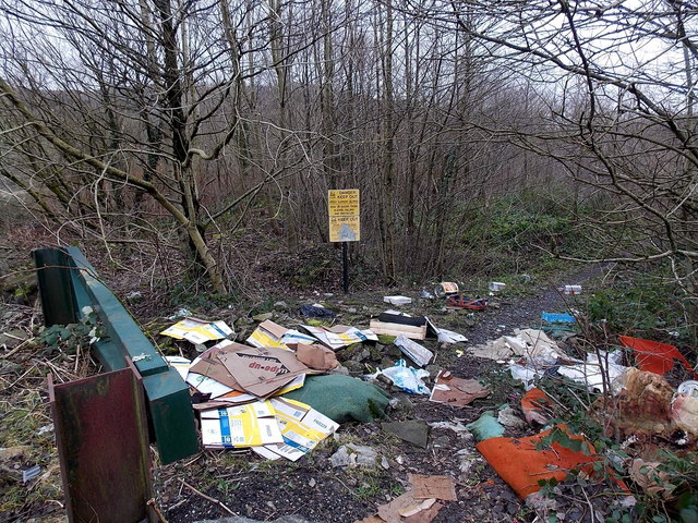 Junk dumped near a danger sign west of Mountain Ash 