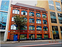 J3473 : Belfast - City Centre - Colourful Red and Blue Four-Storey Building along May Street by Suzanne Mischyshyn