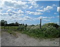 Field gate and footpath signpost near Wickwar