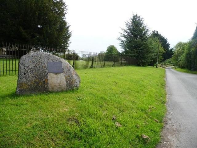 Boulder with population figures, outside Wilsford church