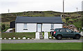 Small cottage with vehicle at Struan