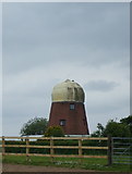 NY1645 : Capped windmill on Langrigg Bank by Matthew Hatton