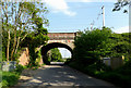 TM0871 : Thornham Road & Railway Bridge by Geographer