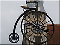 Dorchester: penny-farthing sign in Cornhill