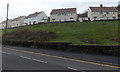 SN7305 : Houses above the B4603 in  Ynysmeudwy by Jaggery