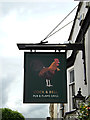 TL8645 : Cock & Bell Public House sign by Geographer