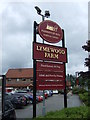 Sign for the Lymewood Farm pub