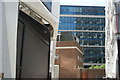 View of City Tower reflected in Standard Chartered