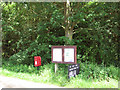 Postbox and information board in Beeston Road