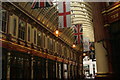 View along the passage leading out into Gracehurch Street from inside Leadenhall Market