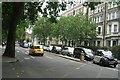 A convoy of taxis on Cromwell Road