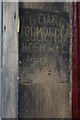 SD9324 : Ghost-sign in a doorway, Halifax Road, Todmorden by Christopher Hilton