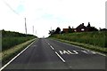 The B4011 passes Addingrove Farm