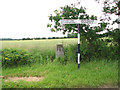 Triangulation pillar at rural crossroads