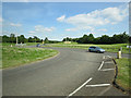 A361 sweeps around a roundabout