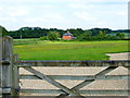 Cottage on West Flexford Lane seen across paddock