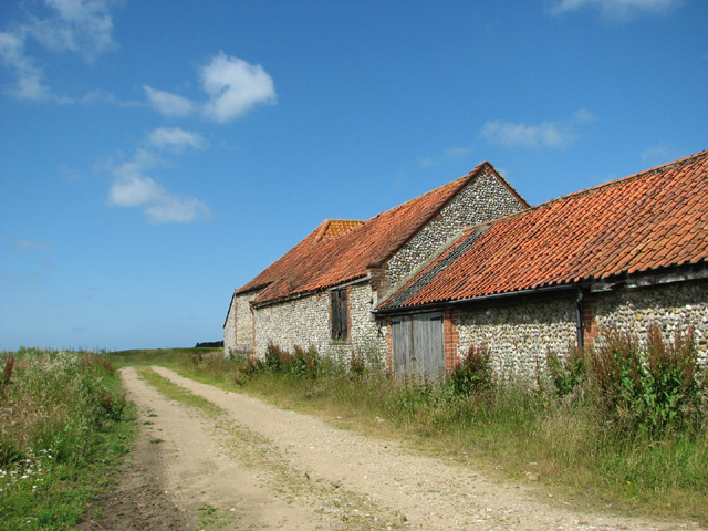 Track past barns by Blue Tile Farm