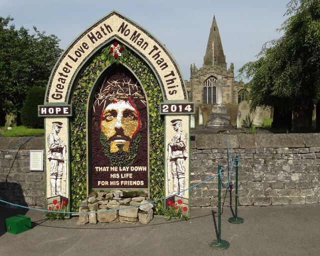 Floral memorial by the church in Hope